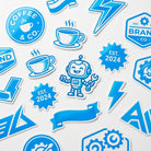 Custom die cut stickers in various shapes with precision-cut edges