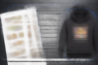 DTF printing process flat lay showing gang sheet, transfer, and finished hoodie